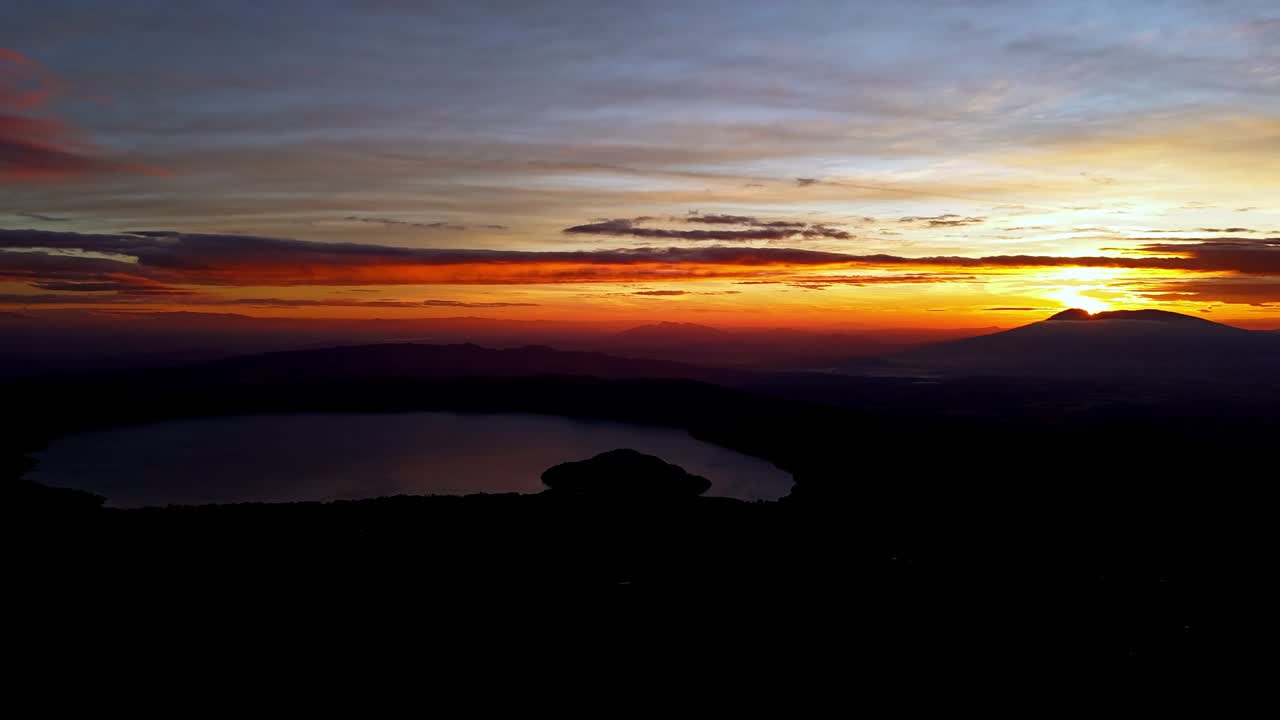Spectacular Sunset Over Lake and Mountains